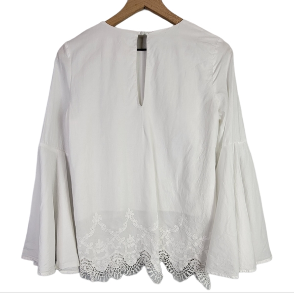 The Jetset Diaries Bell Sleeve Lace Hem Keyhole Back Top White Revolve Small - Picture 5 of 12